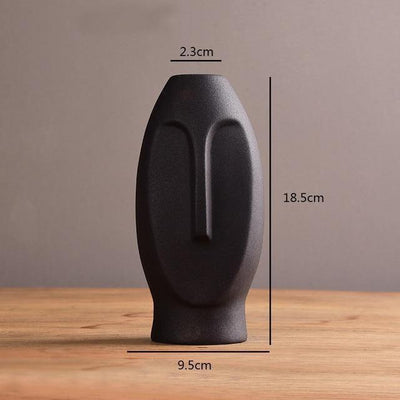 ABSTRACT LONG FACE CERAMIC VASE